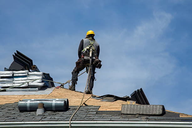 Professional Roofing technician working in North Reading, MA